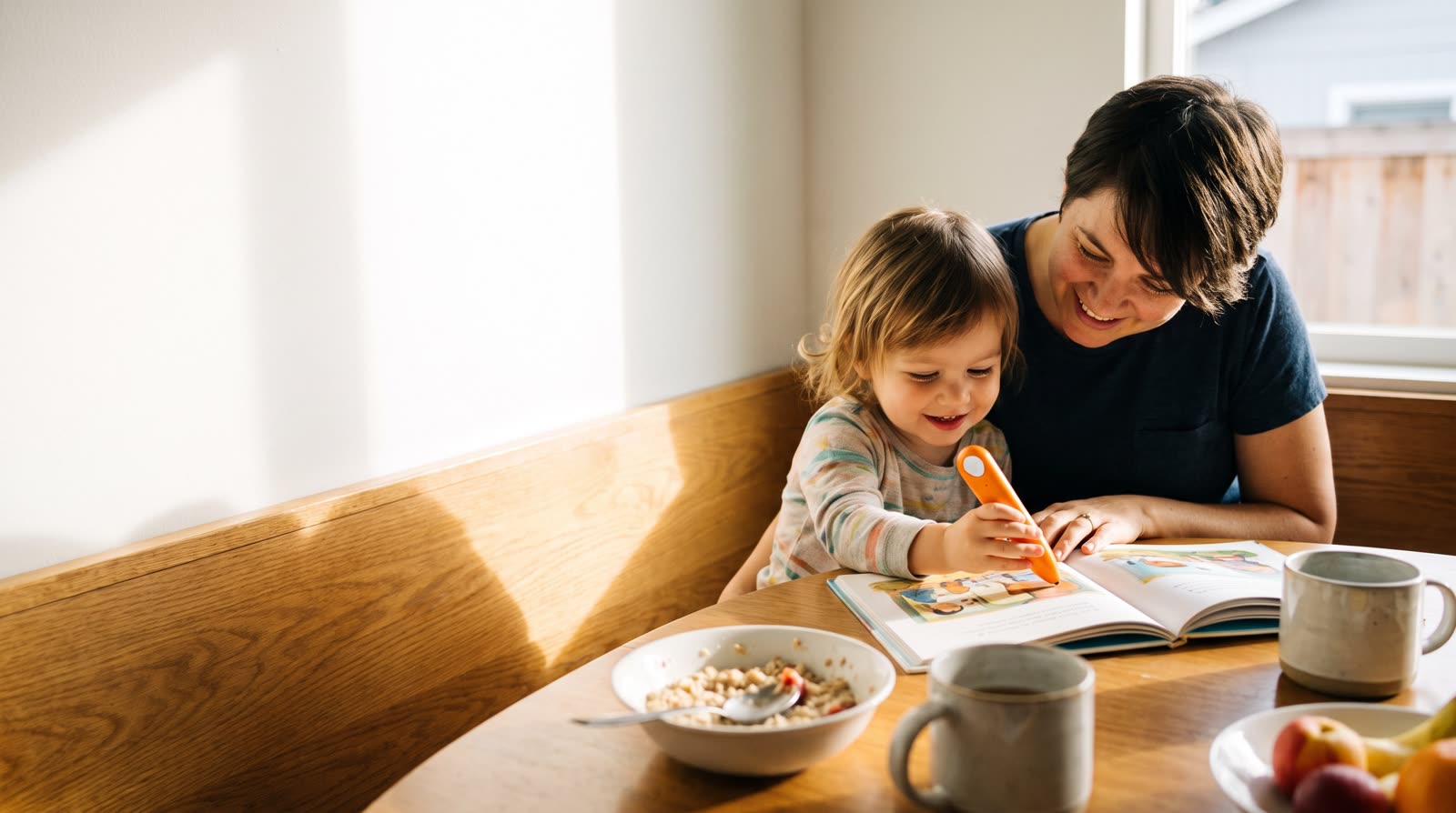 How can parents use reading pen books at home during morning routines?