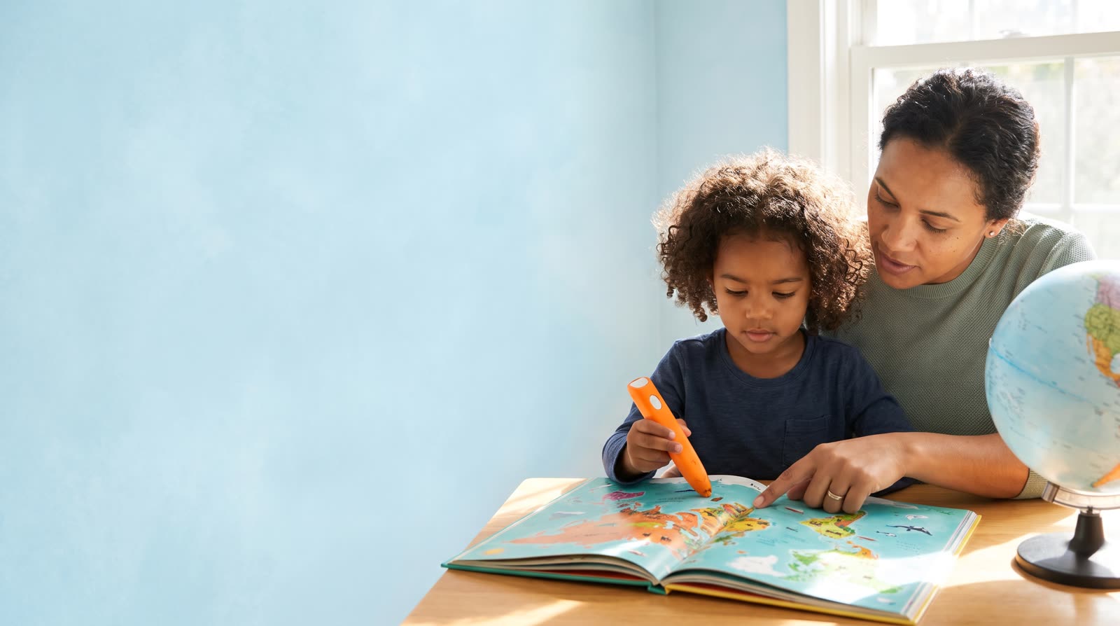 How do I choose new talking picture books about world cultures and geography to expand vocabulary?