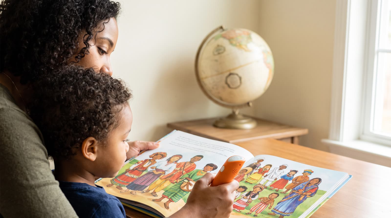How do I choose new talking picture books about world cultures and geography to support bilingual learning?