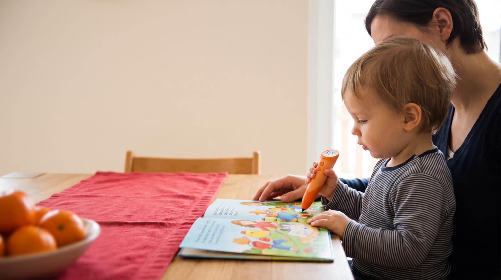 Is a reading pen and talking picture book set a good Chinese New Year gift for a 2-year-old?