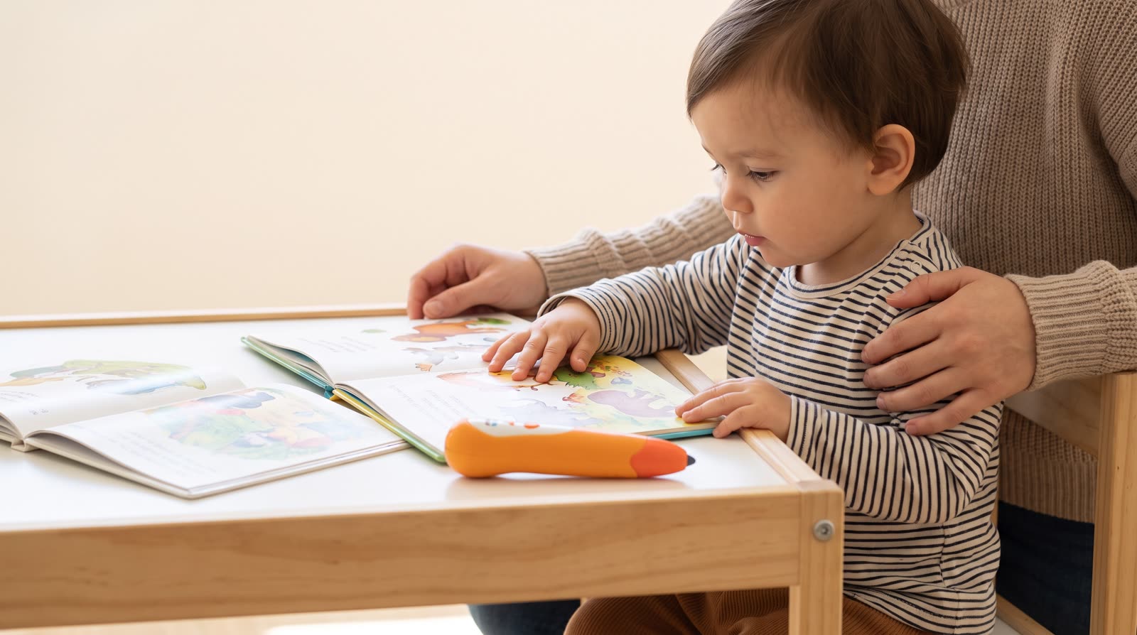 What is the difference between a talking picture book and an ordinary picture book in terms of independent use by toddlers?