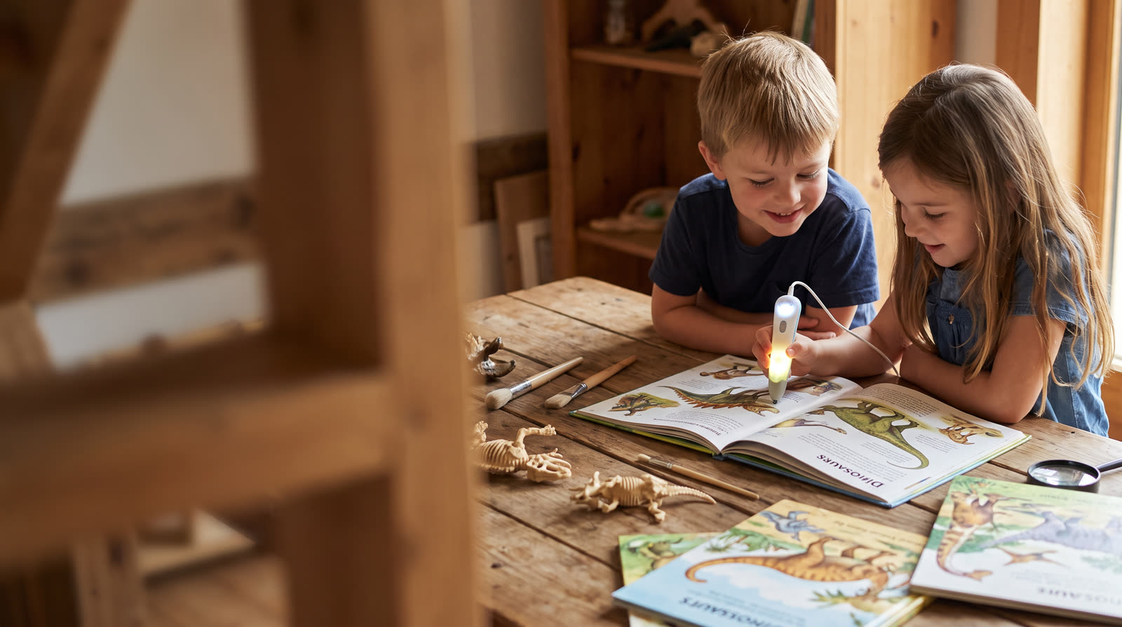 Which Talking Picture Books about Dinosaurs and Science Are Most Engaging for Interactive Games?
