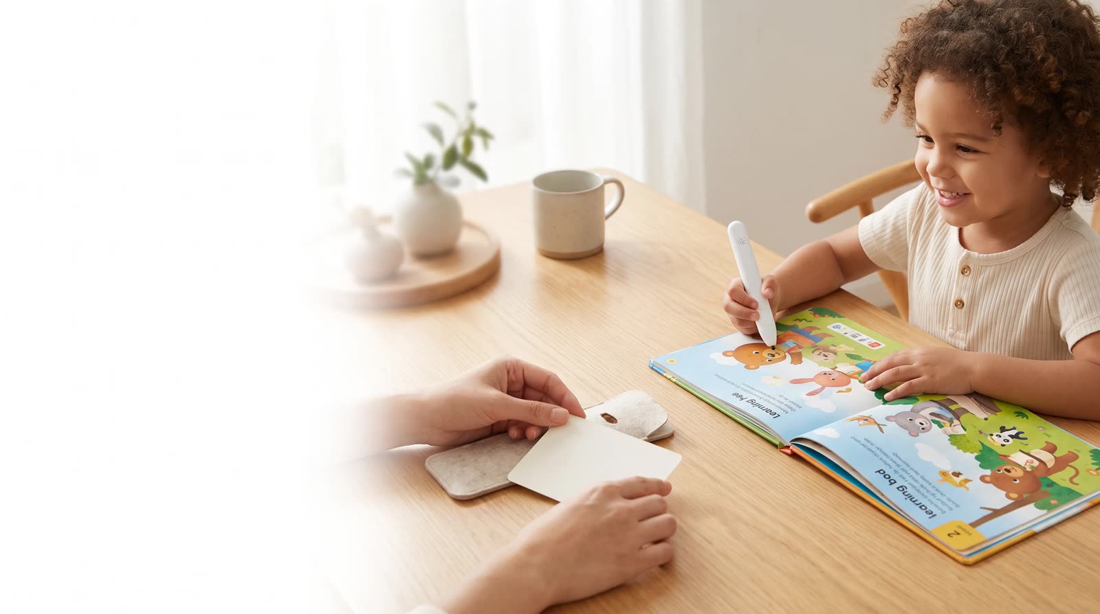 Child using an unbranded reading pen with an interactive learning book during recordable-function use-case review